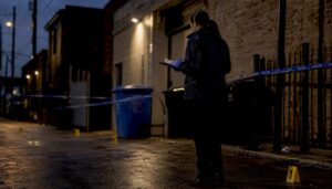 Forensic investigator arriving at residential crime scene