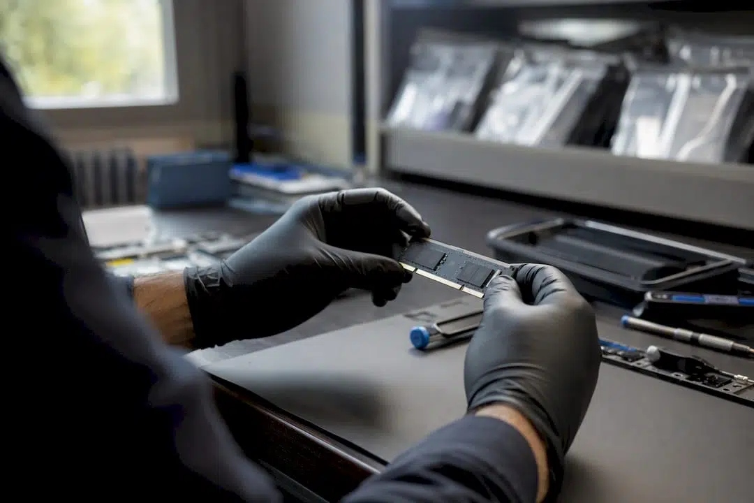 A practical guide to computer forensics and its legal standards 1 Hands holding digital memory chip for forensic analysis