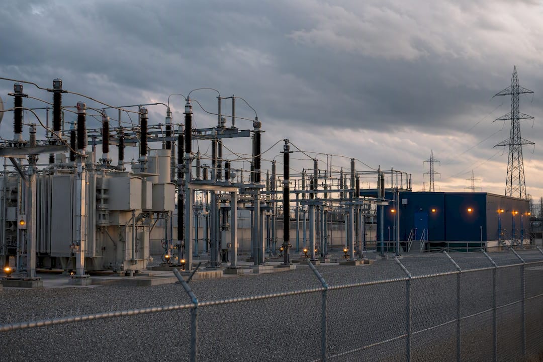 Six Cyber Warfare Examples Lawyers and Investigators Must Study 1 Electrical substation equipment behind security fencing