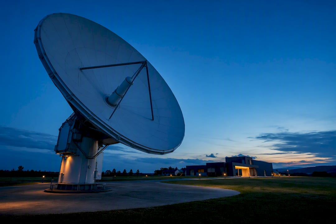 Six Cyber Warfare Examples Lawyers and Investigators Must Study 2 Satellite communications dish at dusk